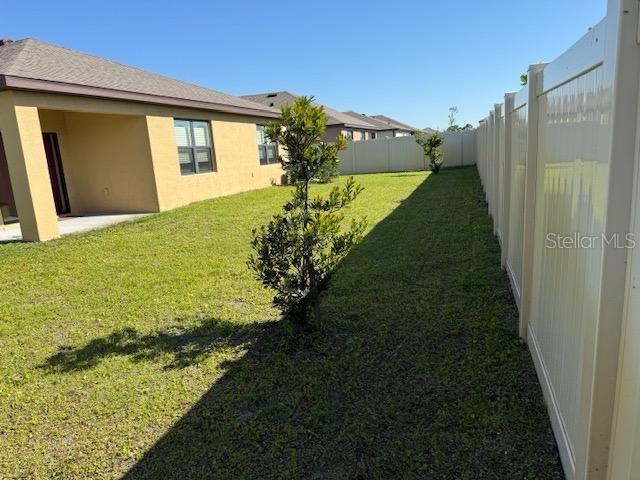 7162 Tigereye Way, Grant, FL 32949 - view of fenced backyard