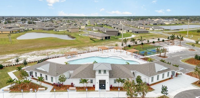 7162 Tigereye Way, Grant, FL 32949 - aerial view of residential area with a pool area and a large body of water