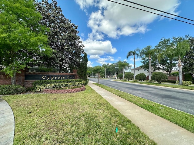 9244 Pecky Cypress Way, Orlando, FL 32836 - exterior space with sidewalks and curbs
