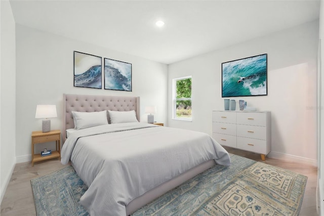 7738 N Creek Way, Citrus Springs, FL 34434 - bedroom with light wood finished floors and recessed lighting