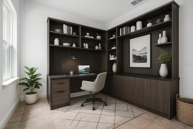 7738 N Creek Way, Citrus Springs, FL 34434 - office space with built in desk and light tile patterned floors