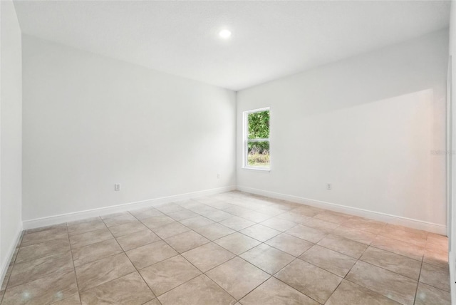 7738 N Creek Way, Citrus Springs, FL 34434 - spare room featuring light tile patterned floors and recessed lighting
