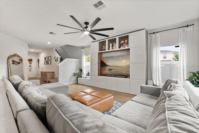 4301 Creek Bank Dr, Kissimmee, FL 34744 - living area with visible vents, ceiling fan, light wood-type flooring, and recessed lighting