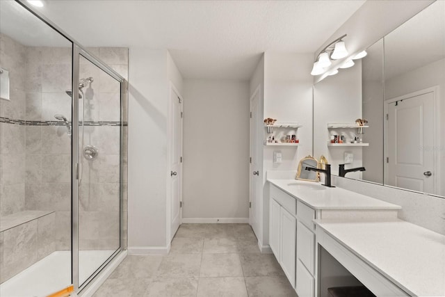 4301 Creek Bank Dr, Kissimmee, FL 34744 - full bath featuring a stall shower, vanity, baseboards, and tile patterned flooring