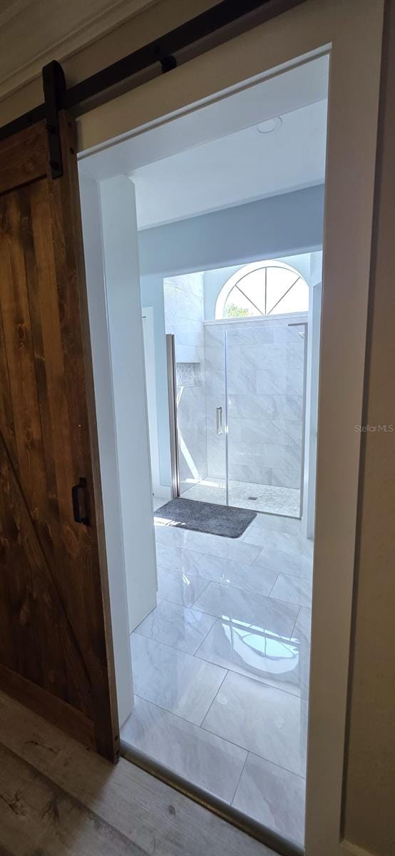 interior space with a barn door