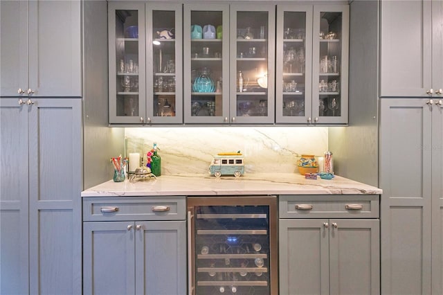 bar with beverage cooler and a dry bar