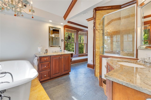 full bathroom with a freestanding tub, recessed lighting, a sink, and a shower stall