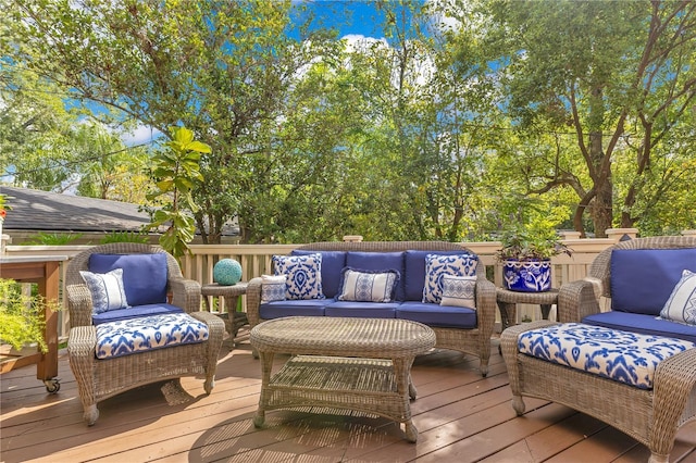 wooden deck featuring outdoor lounge area