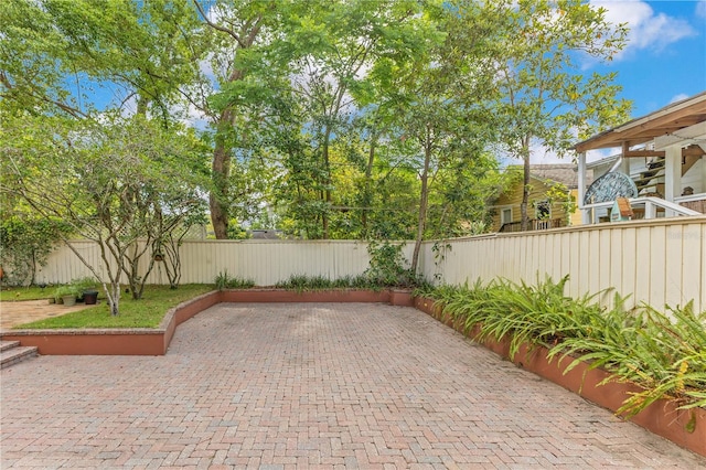 view of patio featuring a fenced backyard