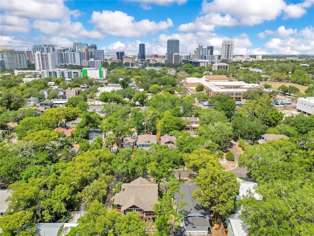 birds eye view of property with a city view