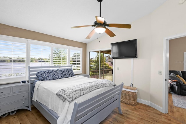 bedroom with lofted ceiling, access to outside, baseboards, ceiling fan, and wood finished floors