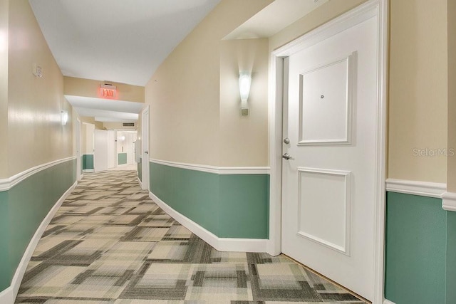 322 E Central Blvd Unit 1008, Orlando, FL 32801 - hall featuring carpet floors, baseboards, and visible vents