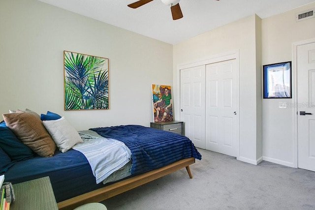 322 E Central Blvd Unit 1008, Orlando, FL 32801 - bedroom featuring carpet flooring, a ceiling fan, baseboards, visible vents, and a closet