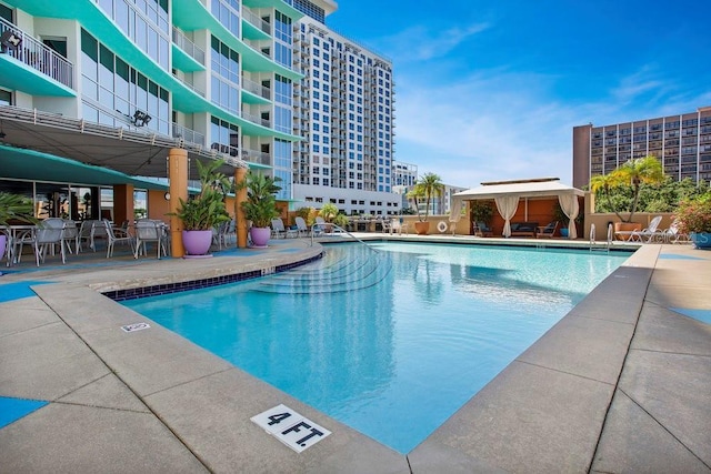 322 E Central Blvd Unit 1008, Orlando, FL 32801 - community pool with a patio area
