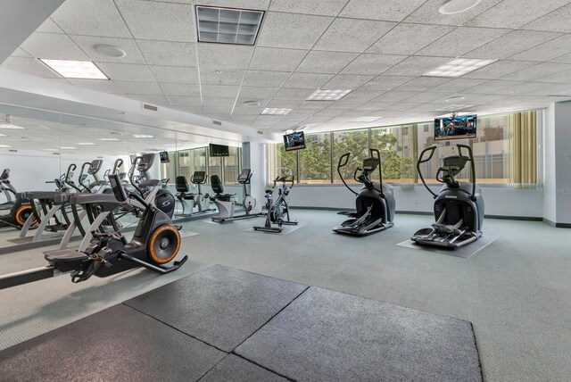 322 E Central Blvd Unit 1008, Orlando, FL 32801 - gym with visible vents and a drop ceiling
