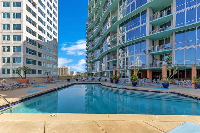 322 E Central Blvd Unit 1008, Orlando, FL 32801 - pool featuring a patio