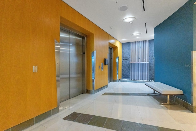 322 E Central Blvd Unit 1008, Orlando, FL 32801 - corridor with tile patterned flooring and elevator