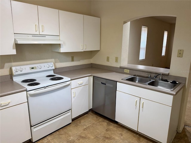107 Vista Verdi Cir Unit 121, Lake Mary, FL 32746 - kitchen with electric range, under cabinet range hood, stainless steel dishwasher, a sink, and white cabinetry