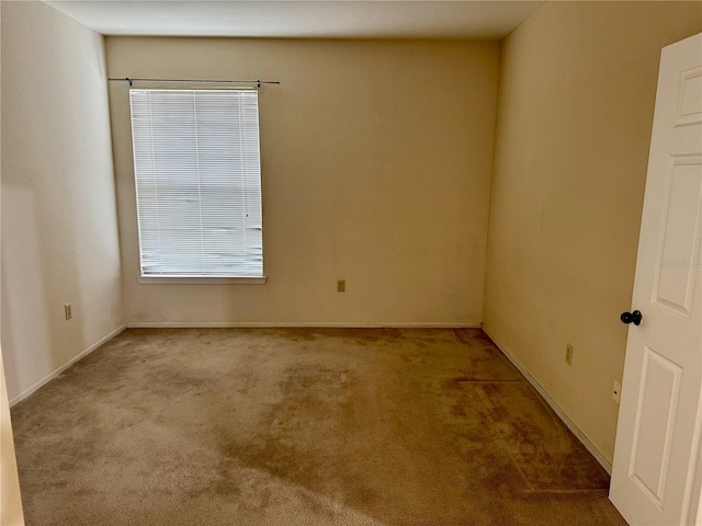 107 Vista Verdi Cir Unit 121, Lake Mary, FL 32746 - carpeted spare room featuring baseboards