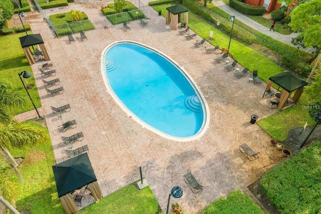 107 Vista Verdi Cir Unit 121, Lake Mary, FL 32746 - community pool featuring a gazebo