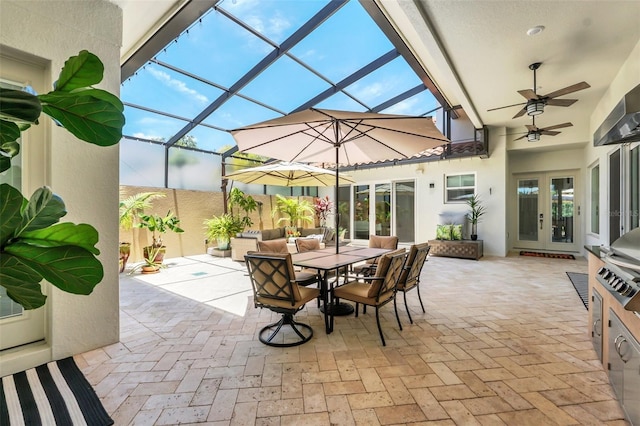 2172 Sherbrook Ave, Davenport, FL 33837 - view of patio / terrace with french doors, outdoor dining space, a ceiling fan, and glass enclosure