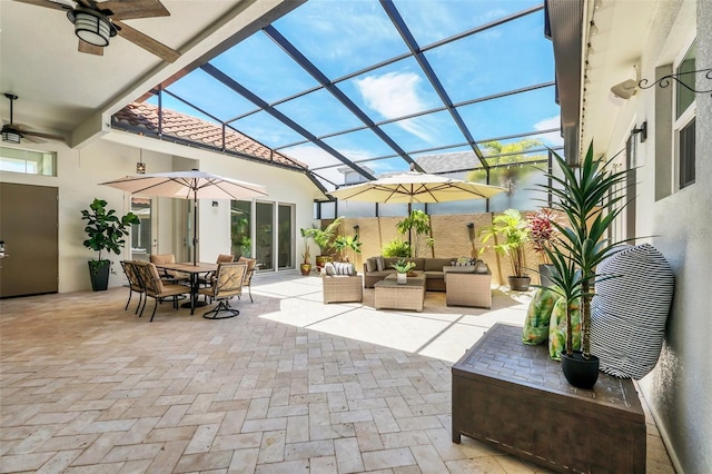 2172 Sherbrook Ave, Davenport, FL 33837 - view of patio / terrace featuring an outdoor living space, outdoor dining space, a ceiling fan, and glass enclosure