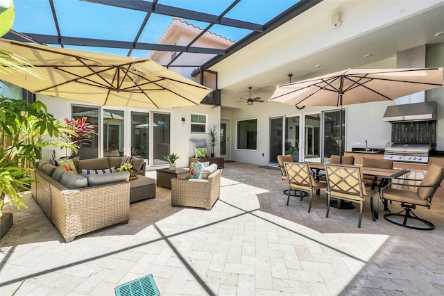 2172 Sherbrook Ave, Davenport, FL 33837 - view of patio with an outdoor hangout area, a ceiling fan, grilling area, a sink, and outdoor dining area