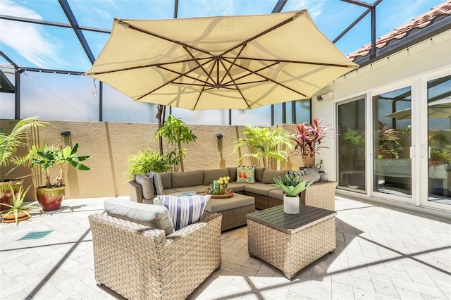 2172 Sherbrook Ave, Davenport, FL 33837 - view of patio / terrace with an outdoor living space, a fenced backyard, and a lanai