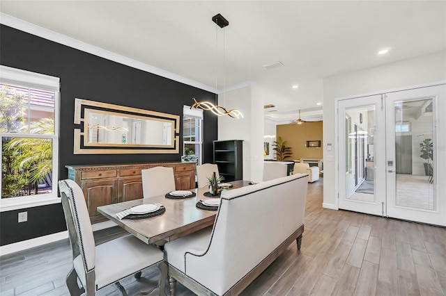 2172 Sherbrook Ave, Davenport, FL 33837 - dining area featuring light wood-style flooring, french doors, baseboards, and recessed lighting