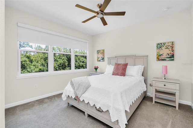 2172 Sherbrook Ave, Davenport, FL 33837 - bedroom featuring light carpet, ceiling fan, and baseboards
