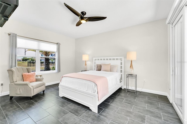 2172 Sherbrook Ave, Davenport, FL 33837 - bedroom featuring baseboards and a ceiling fan