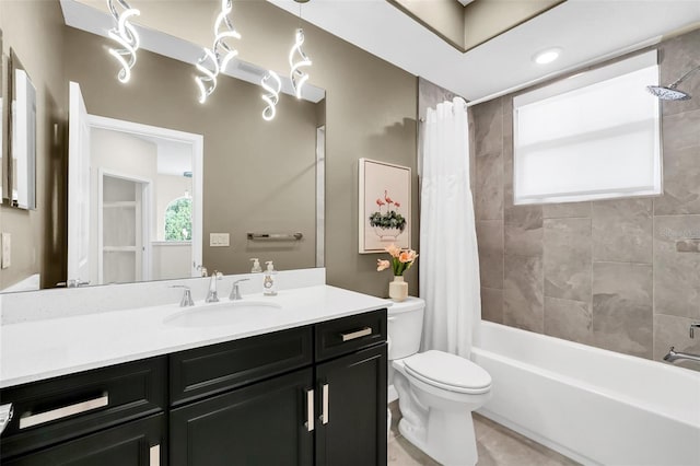 2172 Sherbrook Ave, Davenport, FL 33837 - full bath with toilet, shower / bath combo with shower curtain, vanity, and a healthy amount of sunlight