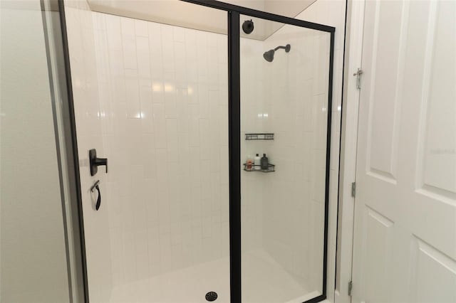 full bathroom featuring a stall shower