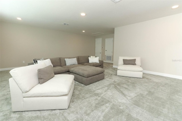 living room featuring recessed lighting, visible vents, and carpet floors