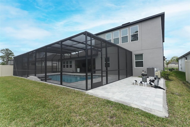 back of property featuring cooling unit, a lawn, a patio area, an outdoor pool, and a lanai