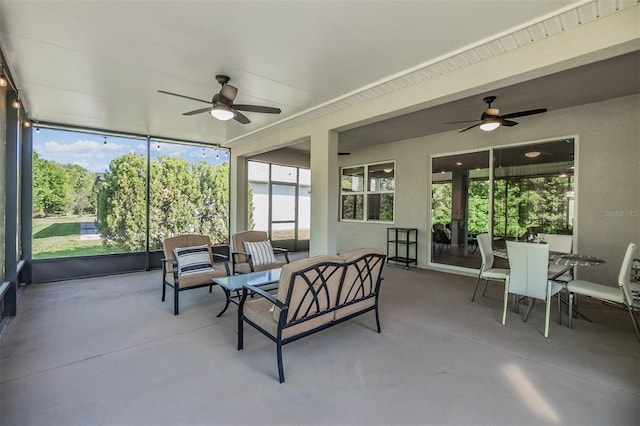 sunroom / solarium with ceiling fan