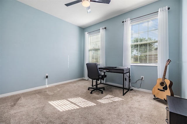 office featuring ceiling fan, baseboards, and carpet floors
