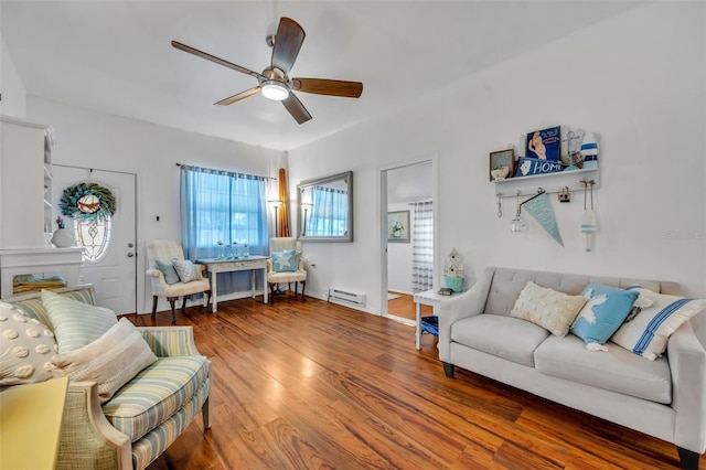 1110 Virginia Ave, Saint Cloud, FL 34769 - living area with a ceiling fan, wood finished floors, and baseboard heating