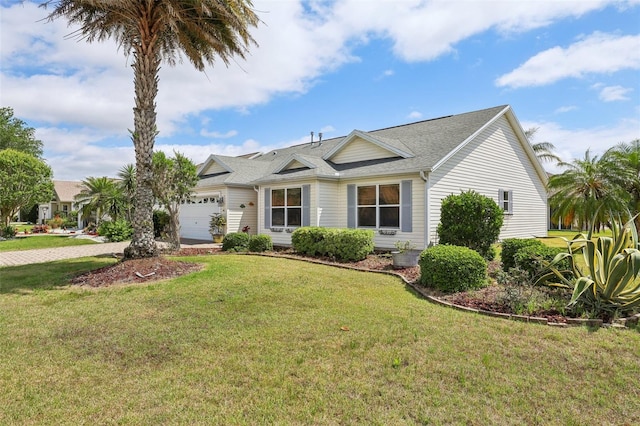 433 Arcadia Lakes Dr, The Villages, FL 32162 - ranch-style house featuring a shingled roof, a garage, driveway, and a front lawn
