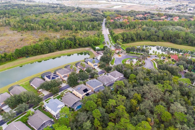 8404 Secret Key Cv, Kissimmee, FL 34747 - drone / aerial view featuring a water view, a residential view, and a forest view