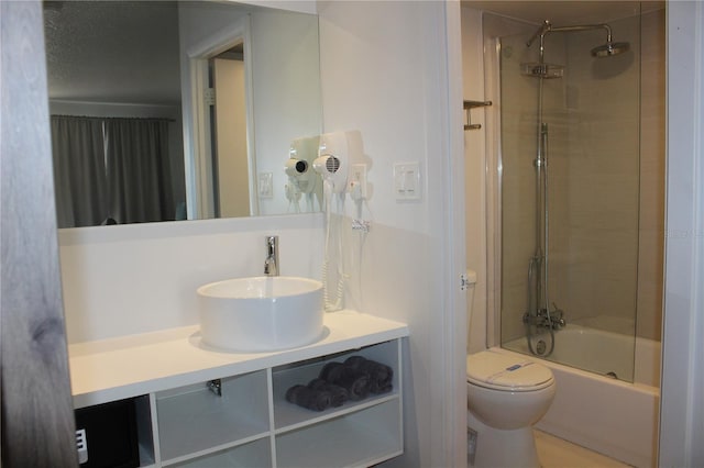 full bathroom featuring toilet, vanity, and shower / bath combination