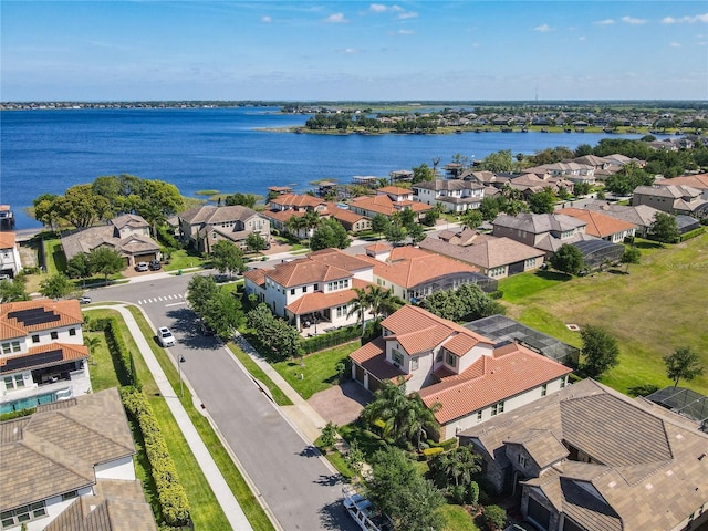 aerial view featuring a water view and a residential view