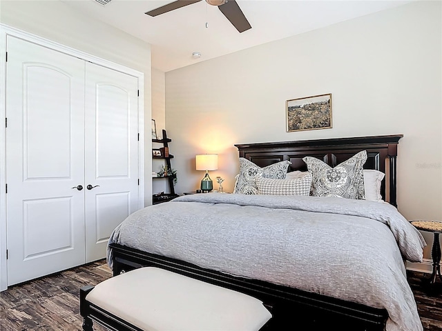 bedroom featuring a closet, a ceiling fan, and dark wood finished floors