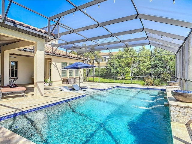pool featuring a patio and a lanai