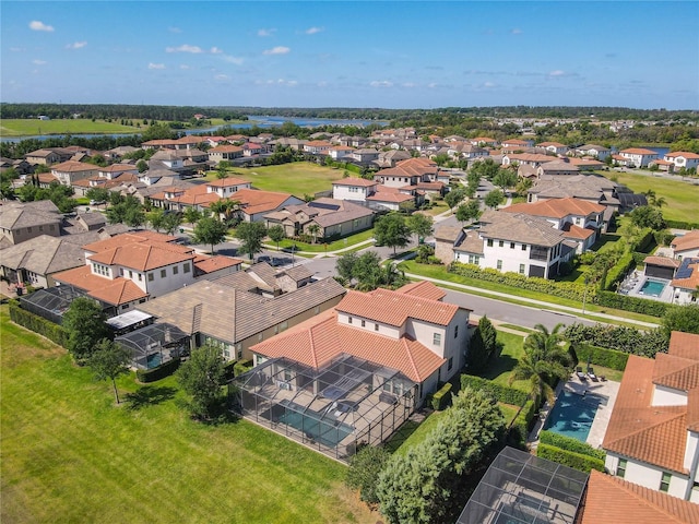 birds eye view of property with a residential view