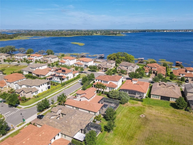 aerial view featuring a residential view and a water view
