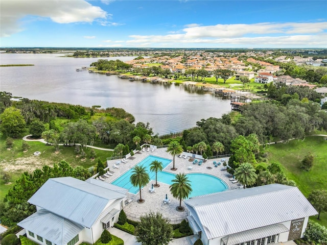 birds eye view of property featuring a water view