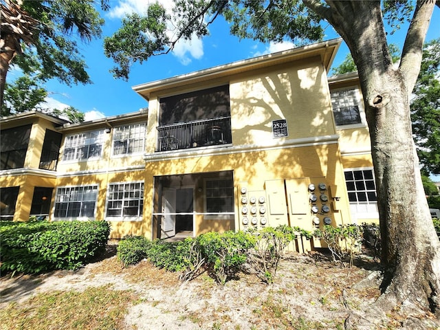 2528 Robert Trent Jones Dr Unit 1617, Orlando, FL 32835 - back of house featuring stucco siding