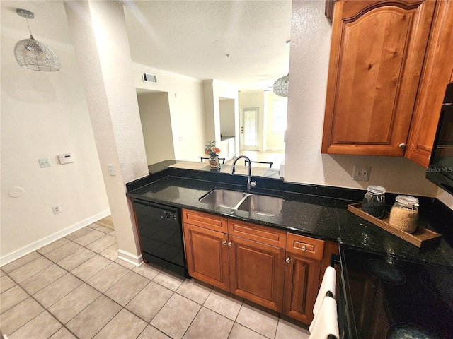 2528 Robert Trent Jones Dr Unit 1617, Orlando, FL 32835 - kitchen featuring visible vents, light tile patterned flooring, dishwasher, a sink, and electric stove