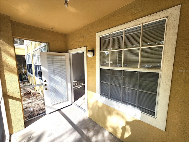 2528 Robert Trent Jones Dr Unit 1617, Orlando, FL 32835 - doorway to property with stucco siding